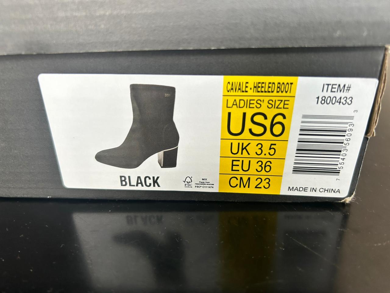 Botas DKNY de tacón Cavale-heleed en color negro Talla 3 MX